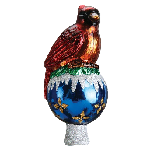 Red cardinal tree topper perched on a shiny blue ornament-shaped base with white snowy accents, gold details, and a silver glittered stem.
