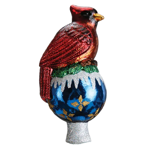 Side view of the Cardinal Tree Topper showing the red bird, blue ornament-shaped base, white snowy trim, and silver glittered stem.
