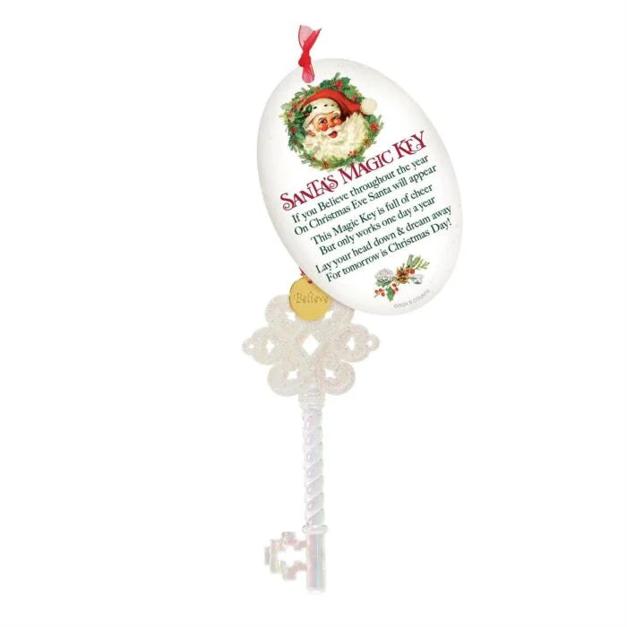 Santa’s Magic Key ornament with glittery decorative key, Believe charm, red ribbon, and poem tag featuring Santa’s face and Christmas message.