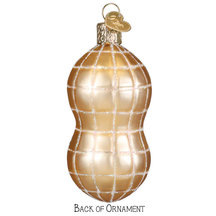 Decorative glass ornament shaped like a peanut with a smiling face on a white background back view