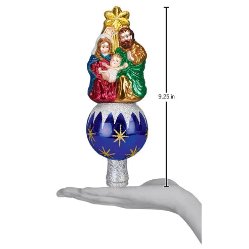 Nativity Tree Topper shown standing on a hand for scale, measuring 9.25 inches tall.