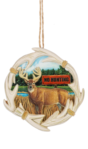 No Hunting Deer ornament featuring a brown buck standing in a nature scene with trees, water, and tall grass, framed by a ring of antlers and a rustic “No Hunting” sign.