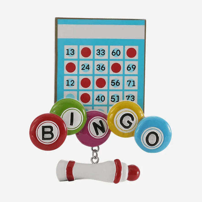 Bingo game card ornament with colorful balls and a card on a white background