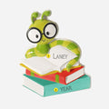Green Book Worm with glasses reading a book ornament on a white background