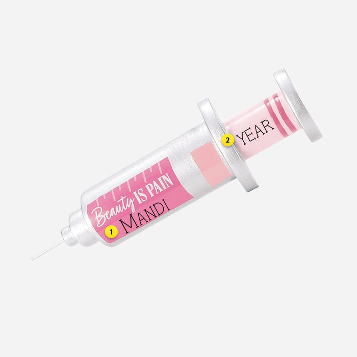 Pink and white botox syringe-shaped Ornament with text on a white background