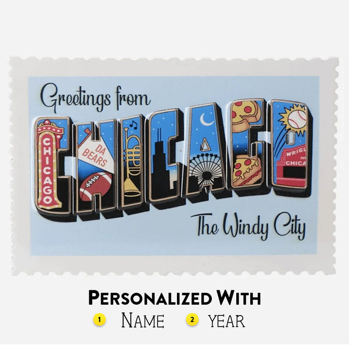 Postcard Ornament with 'Greetings from Chicago' design featuring city icons on a light blue background.