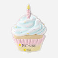Pastel-colored birthday cupcake-shaped Ornament with a candle and can be personalized on a white background