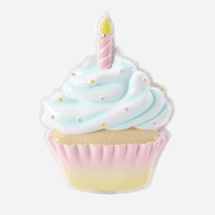 Pastel-colored birthday cupcake-shaped Ornament with a candle and can be personalized on a white background