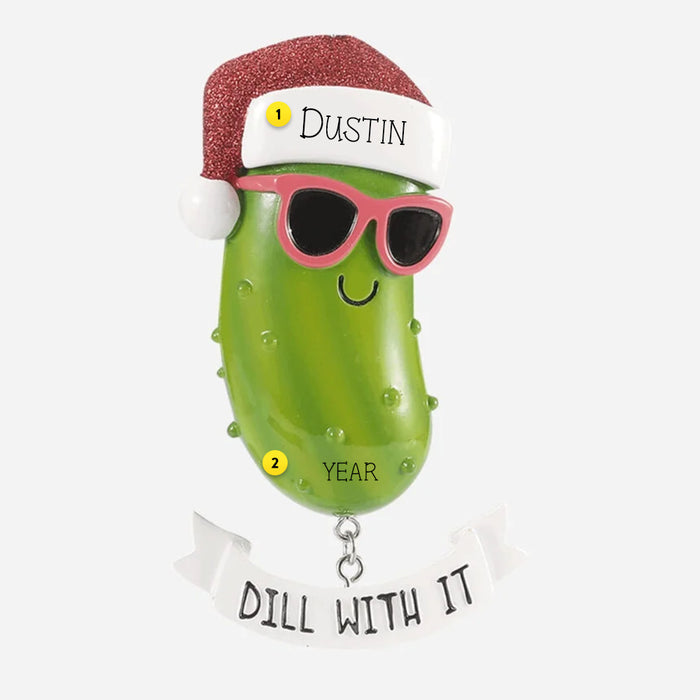 Green pickle ornament with sunglasses and Santa hat, and a hanging banner with 'Dill with it'. Can be personalized
