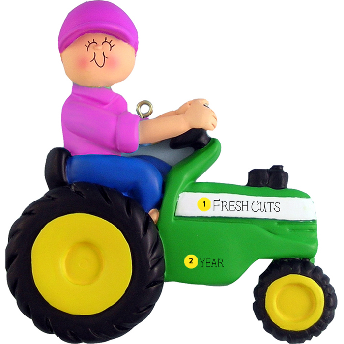 Decorative ornament of a person on a green tractor with personalized text, on a white background.