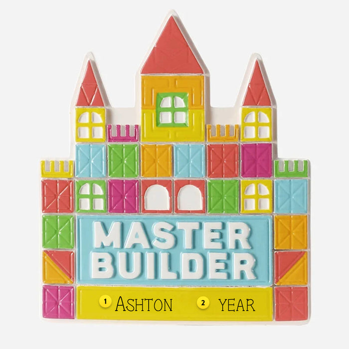 Colorful toy block ornament shaped like a castle with 'MASTER BUILDER' text on a white background can be personalized