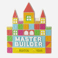 Colorful toy block ornament shaped like a castle with 'MASTER BUILDER' text on a white background can be personalized