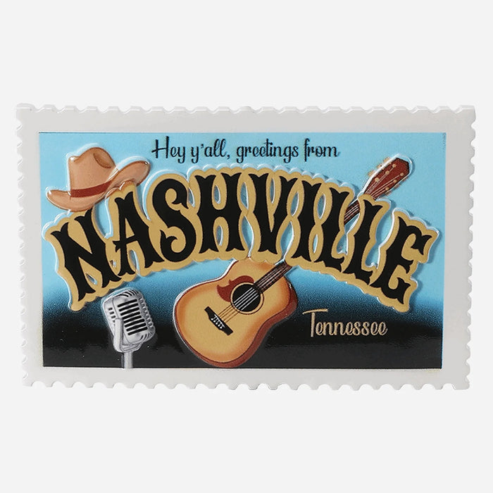 Postcard Ornament with 'Greetings from Nashville, Tennessee' text, guitar, cowboy hat, and microphone on a blue background.