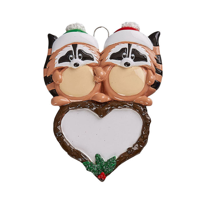 Christmas ornament with two raccoons on a heart-shaped base