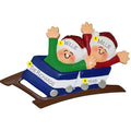 Personalized Christmas ornament of two people on a roller coaster with names and year details.