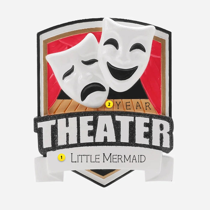 Decorative ornament with theater masks and text on a white background