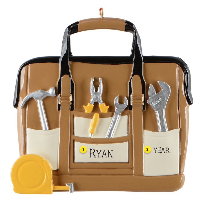 Decorative tool bag ornament with tools on a white background