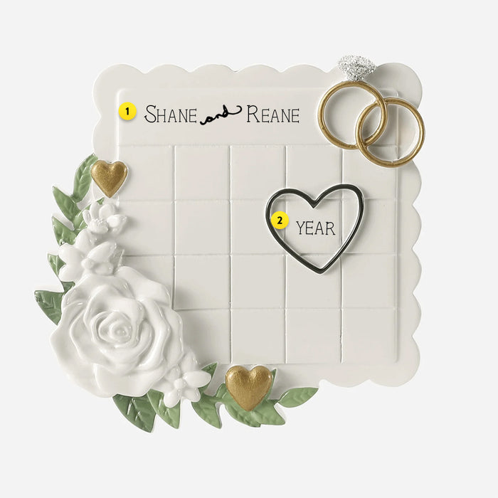 Wedding Calendar Keepsake ornament decorated with rings, heart and rose. Can be personalized.