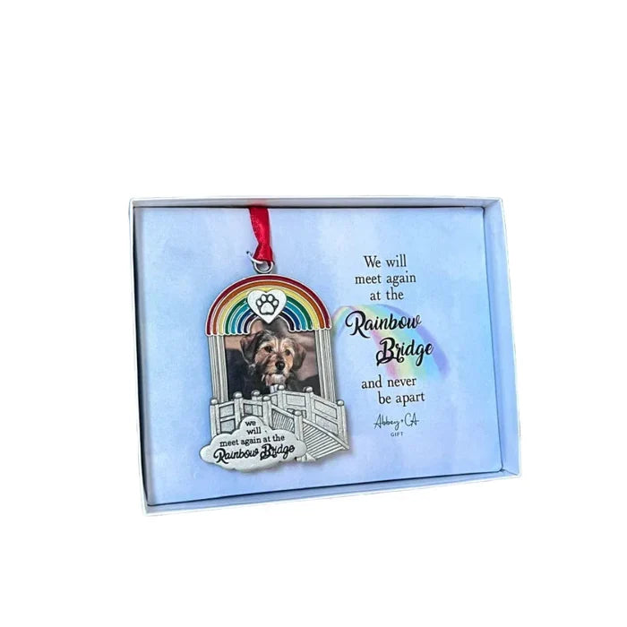 Rainbow Bridge pet picture frame ornament shown in a gift box with printed sentiment about meeting again at the Rainbow Bridge.