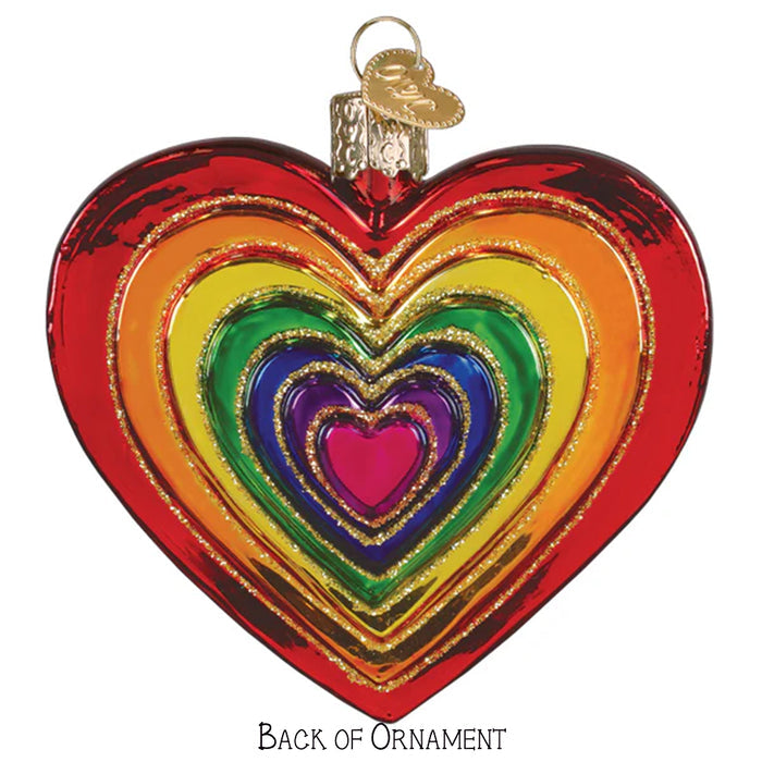 Colorful heart-shaped ornament with rainbow design on a white background