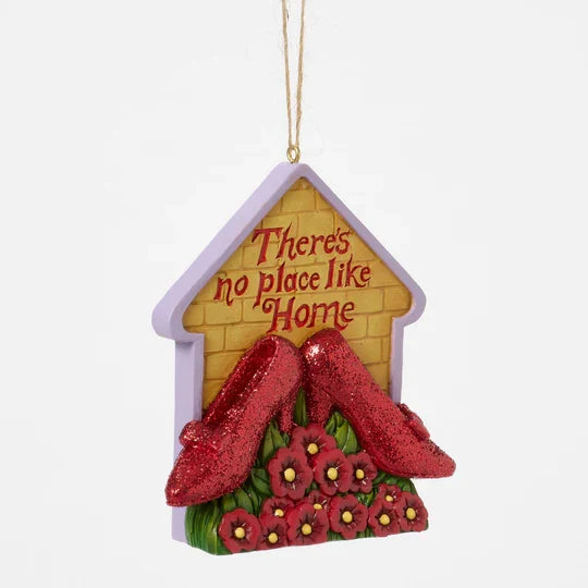 House-shaped ornament with glittery red slippers, red poppies, yellow brick background, and the phrase There’s No Place Like Home. Side View