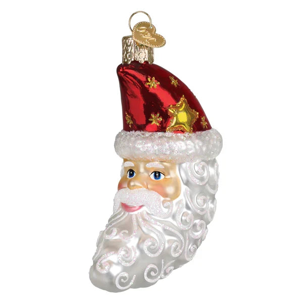 Glass ornament shaped like a Santa Claus head with a red hat on a white background