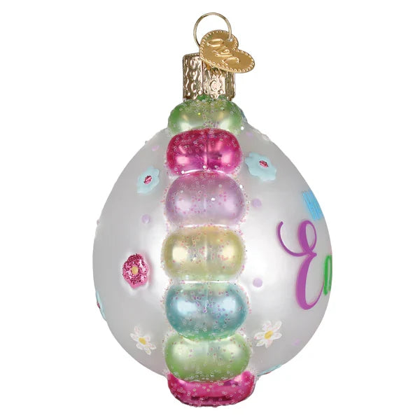 Easter egg ornament with 'Happy Easter' text on a white background side view